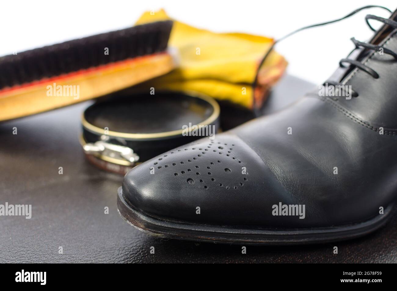 Shoe polish,brush, rag and black shoe Stock Photo Alamy
