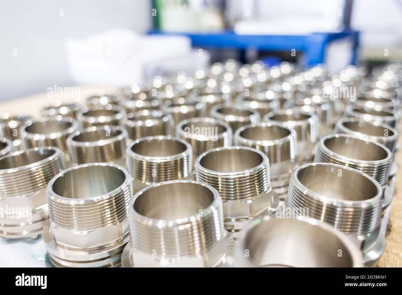 many metal pipe couplings in a pipe factory Stock Photo Alamy
