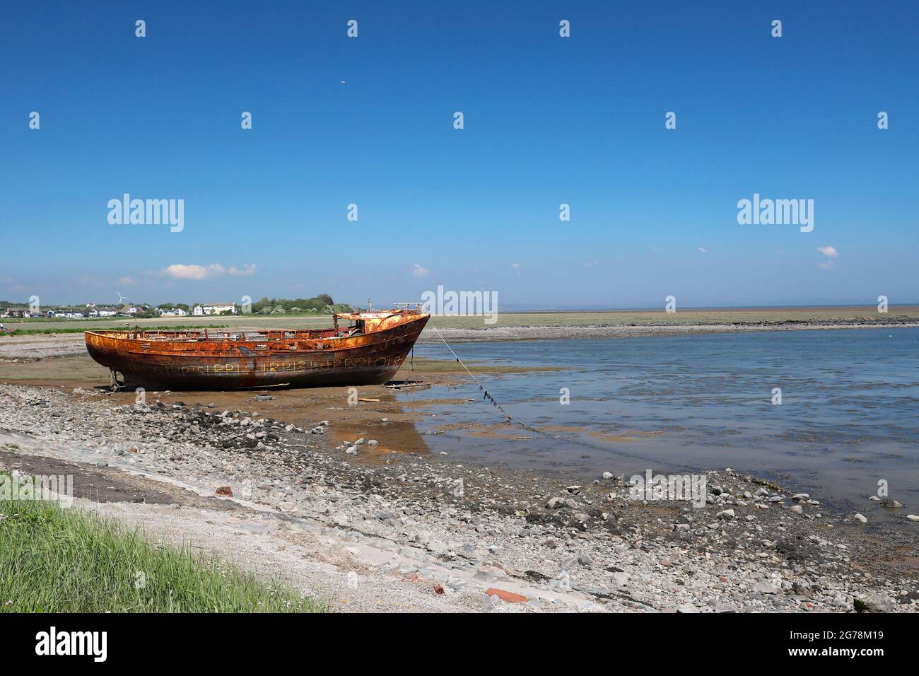 Rusting Boat in Morecambe Bay, Cumbria Stock Photo