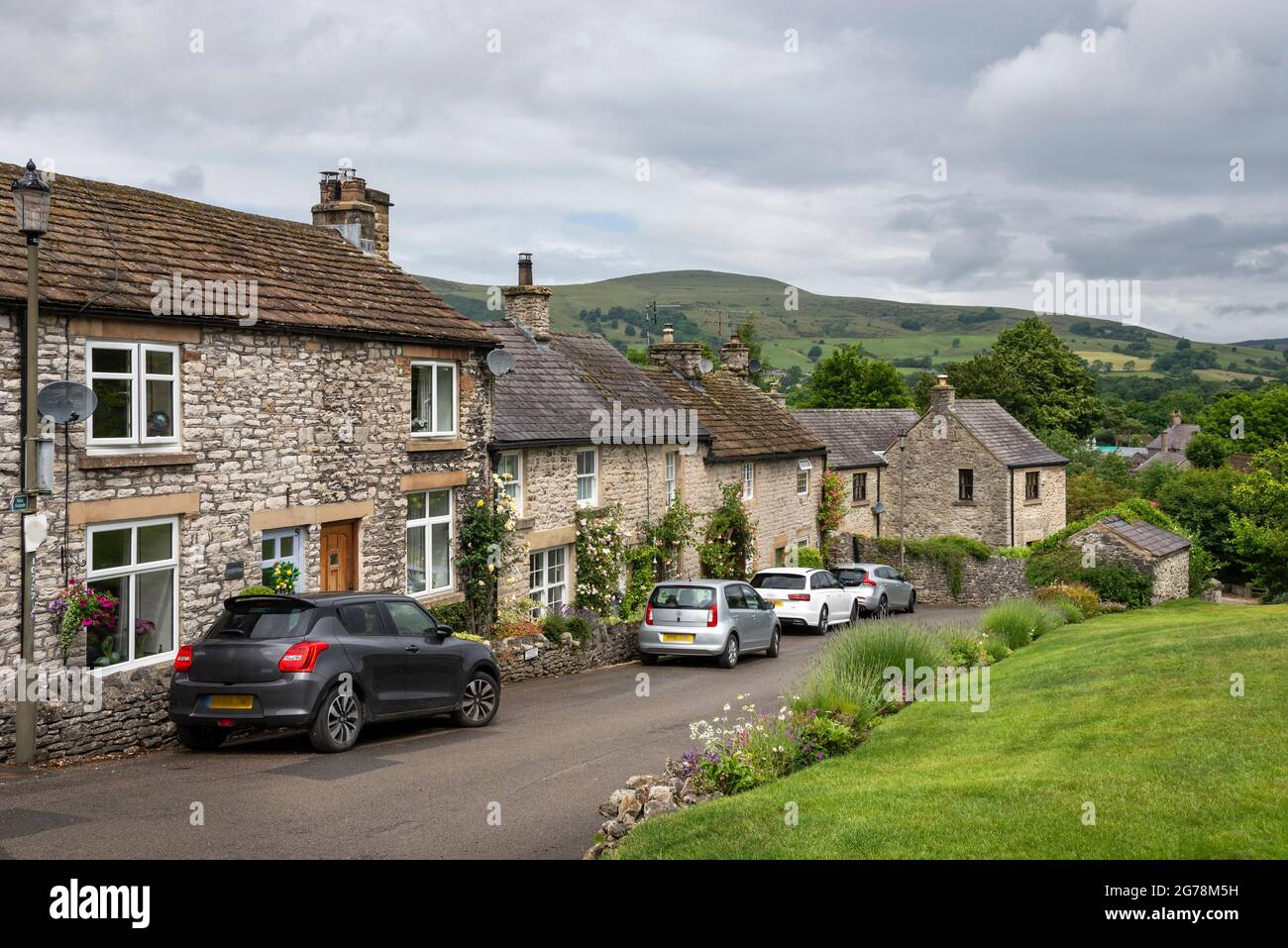Street of stone cottages in the picturesque village of Castleton in the Hope Valley, Derbyshire, England. Stock Photo