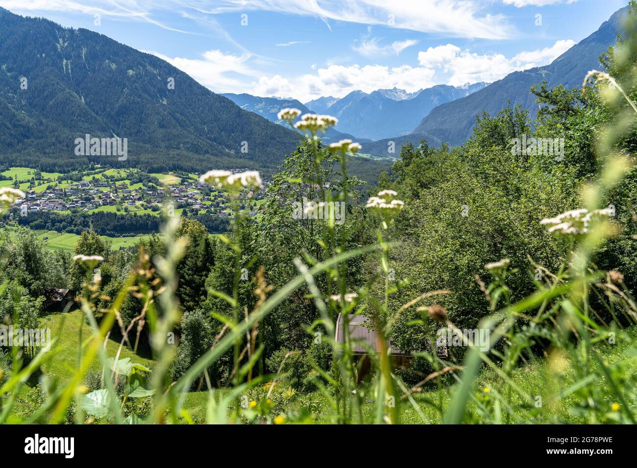 Europe, Austria, Tyrol, Ötztal Alps, Ötztal, Oetz, view from a mountain meadow above Oetz to the front Ötztal and the village of Sautens Stock Photo