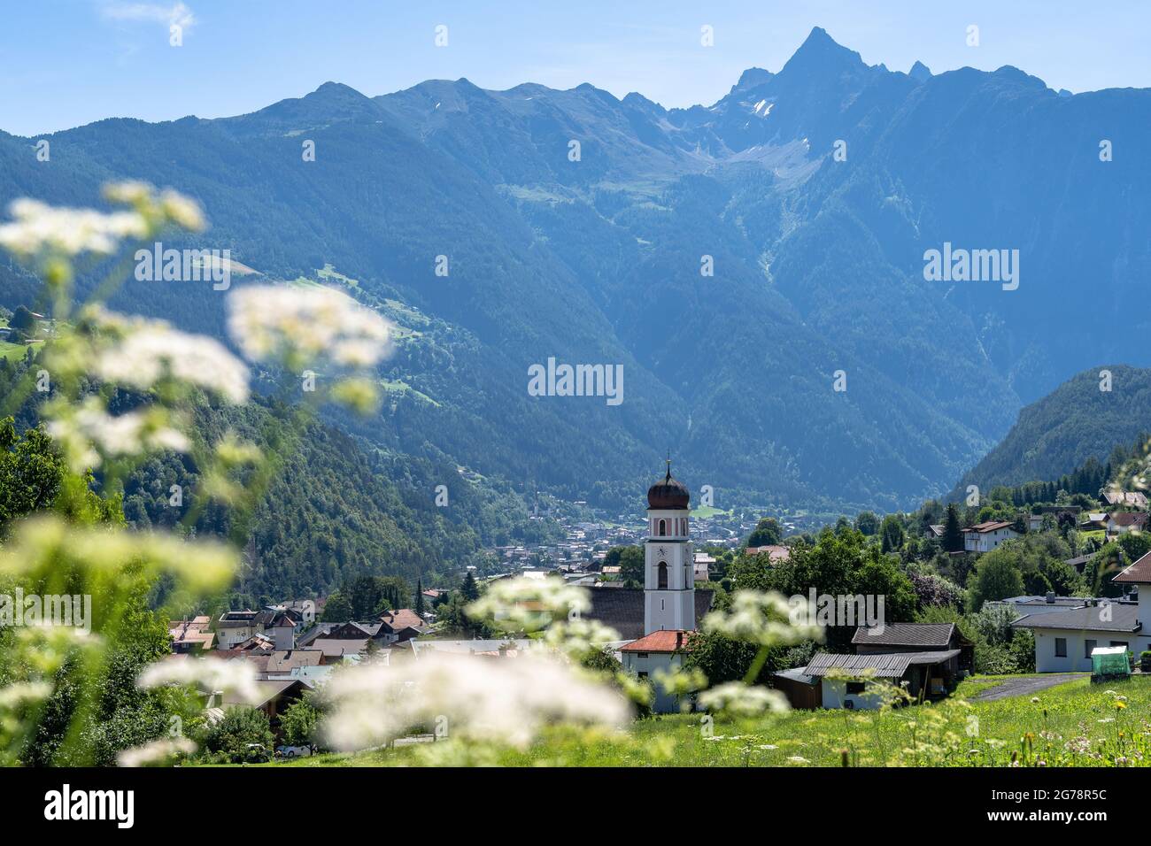 Europe, Austria, Tyrol, Ötztal Alps, Ötztal, Sautens, view over the parish church of Sautens to the Acherkogel Stock Photo