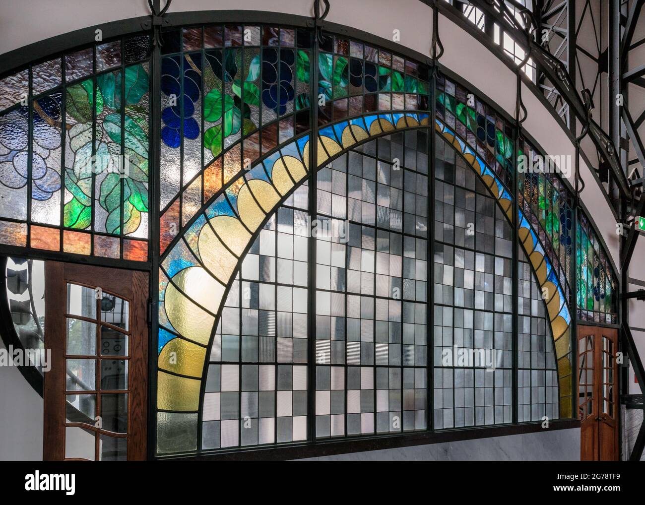 Art Nouveau stained glass window of the portal of the machine hall at Zeche Zollern colliery industrial heritage site, Dortmund, Ruhr area, Germany Stock Photo