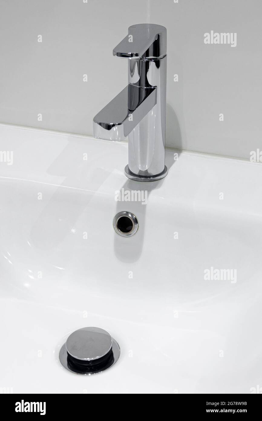 Bath shower mixer tap. Water tap made of chrome material. Scandinavian