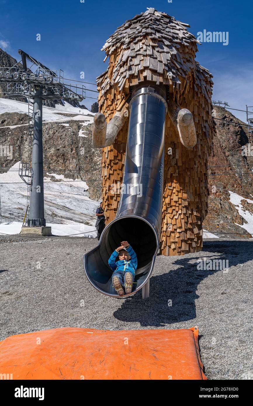 Europe, Austria, Tyrol, Stubai Alps, mammoth slide at the mountain station of the 3S-Bahn Eisgrat mountain station on the Stubai Glacier Stock Photo