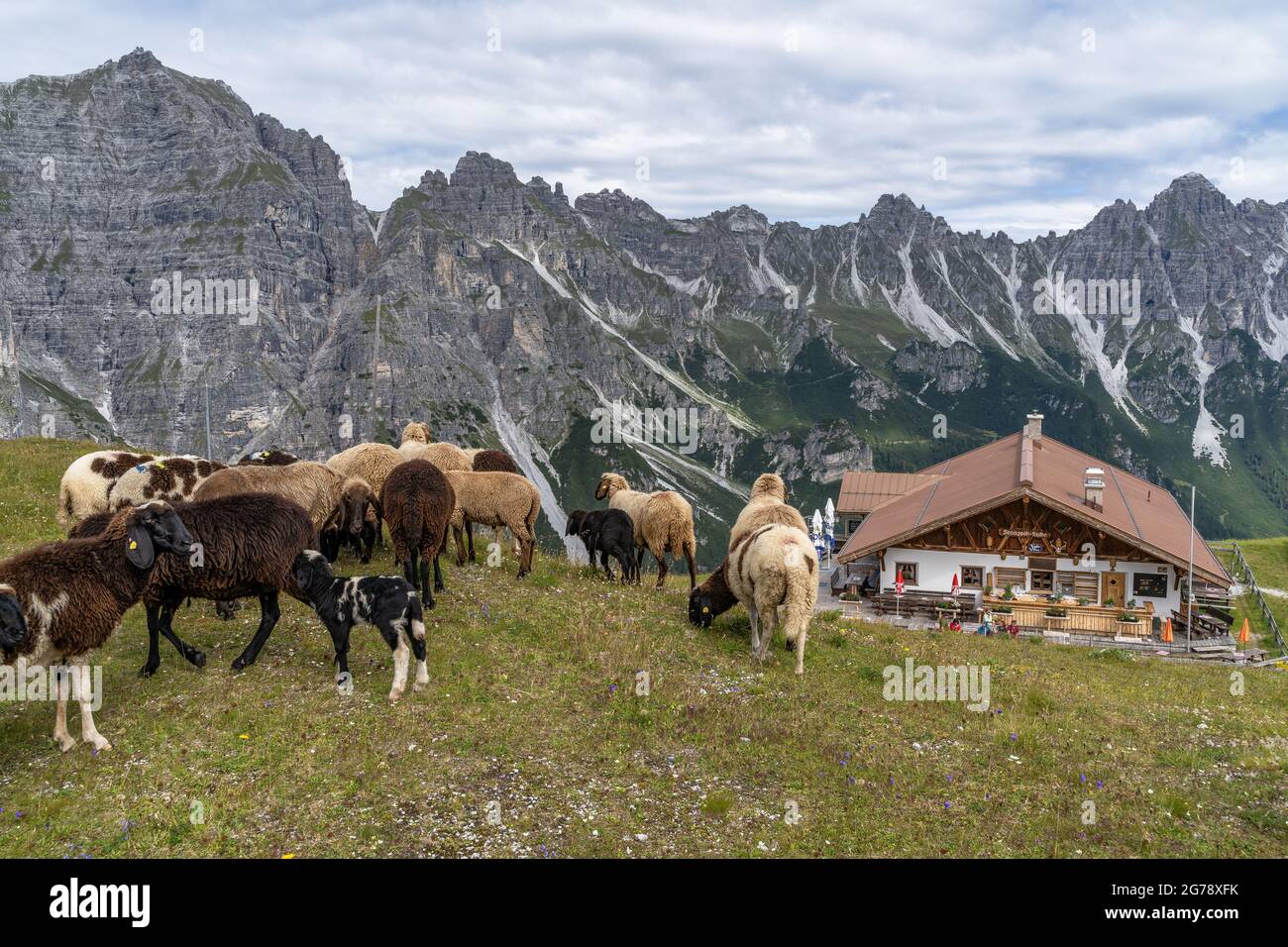 Europe, Austria, Tyrol, Stubai Alps, Sennjochhütte in front of the rugged backdrop of the Kalkkögel Stock Photo