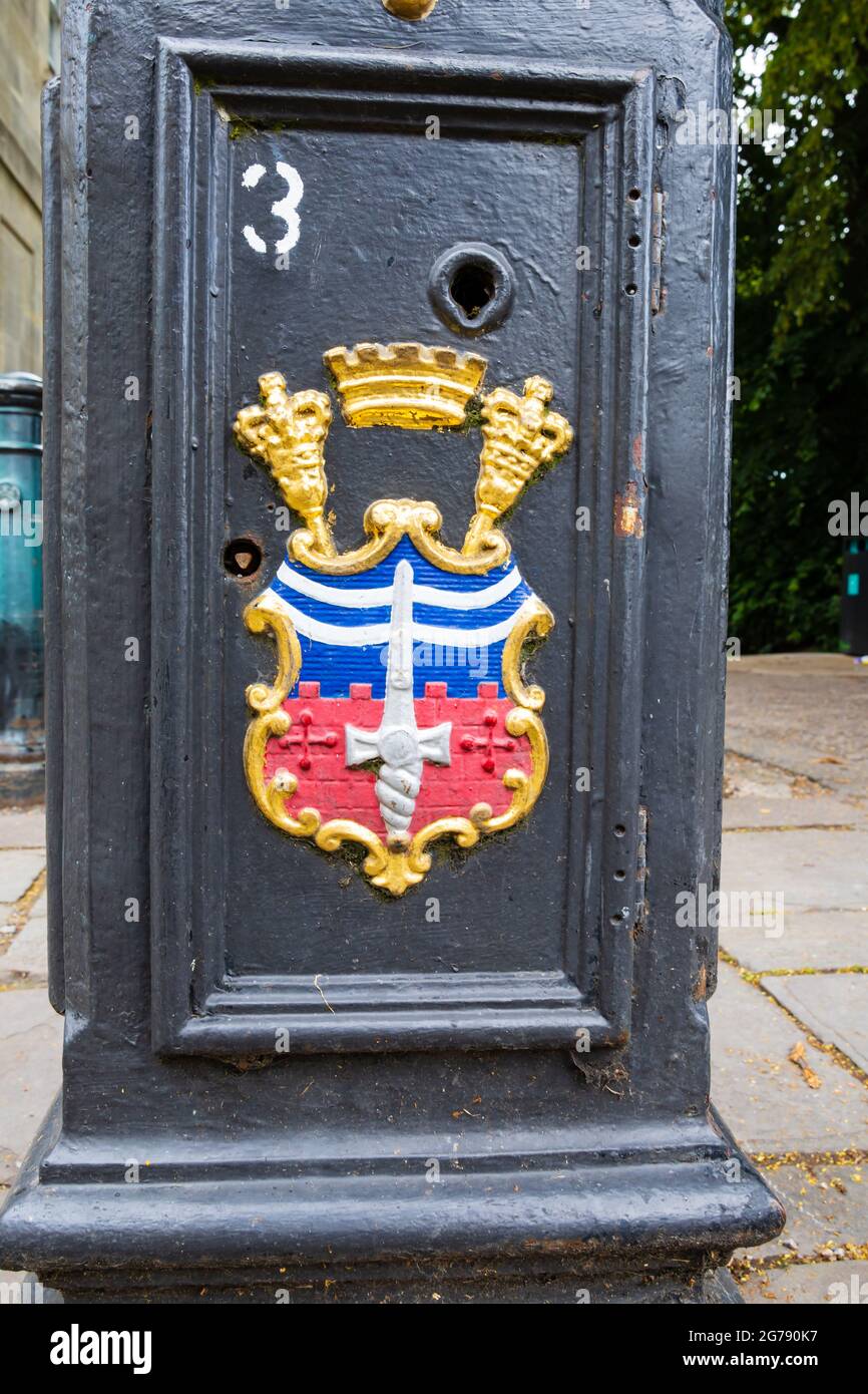 Bath City crest coat of arms painted on a lampost. The Roman City of Bath, Somerset, England Stock Photo