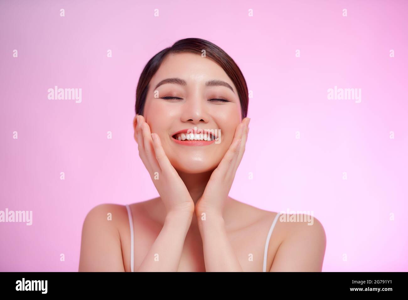 Young Woman Spa Model with Healthy Skin. Facial Treatment, Spa Beauty and Healthcare Concept Stock Photo