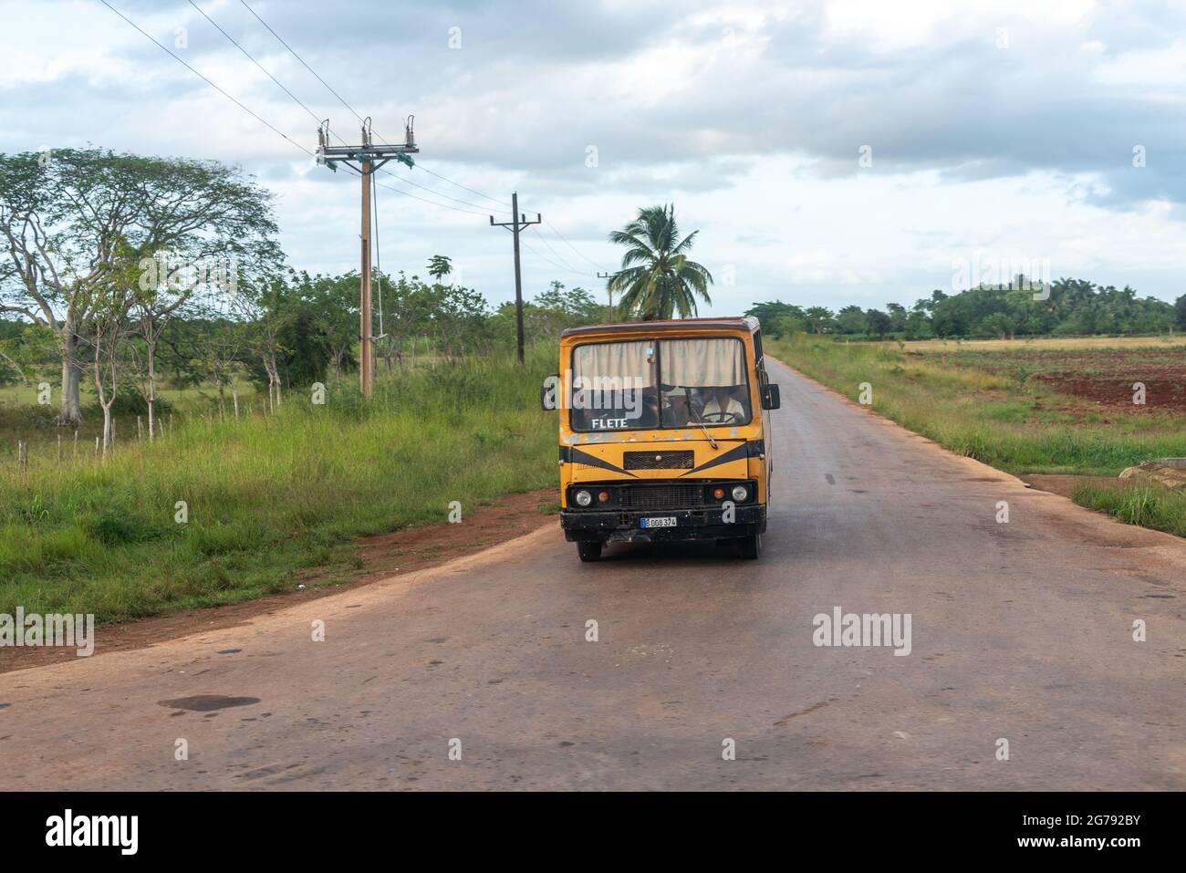 Bus driving on road hi-res stock photography and images - Alamy