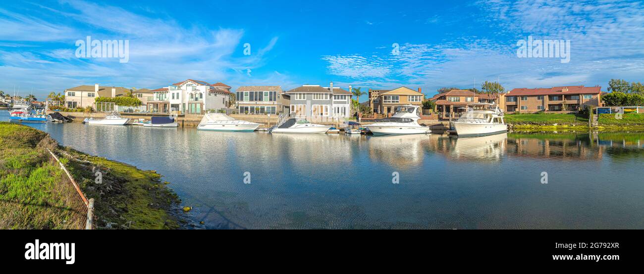 Estates at Huntington Beach, Southern California with yachts Stock Photo