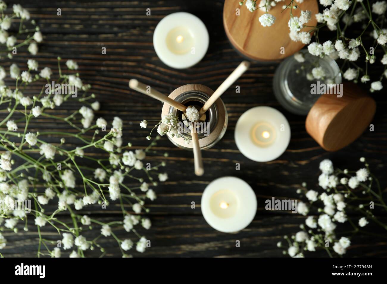 Aromatic concept with diffuser on wooden table Stock Photo