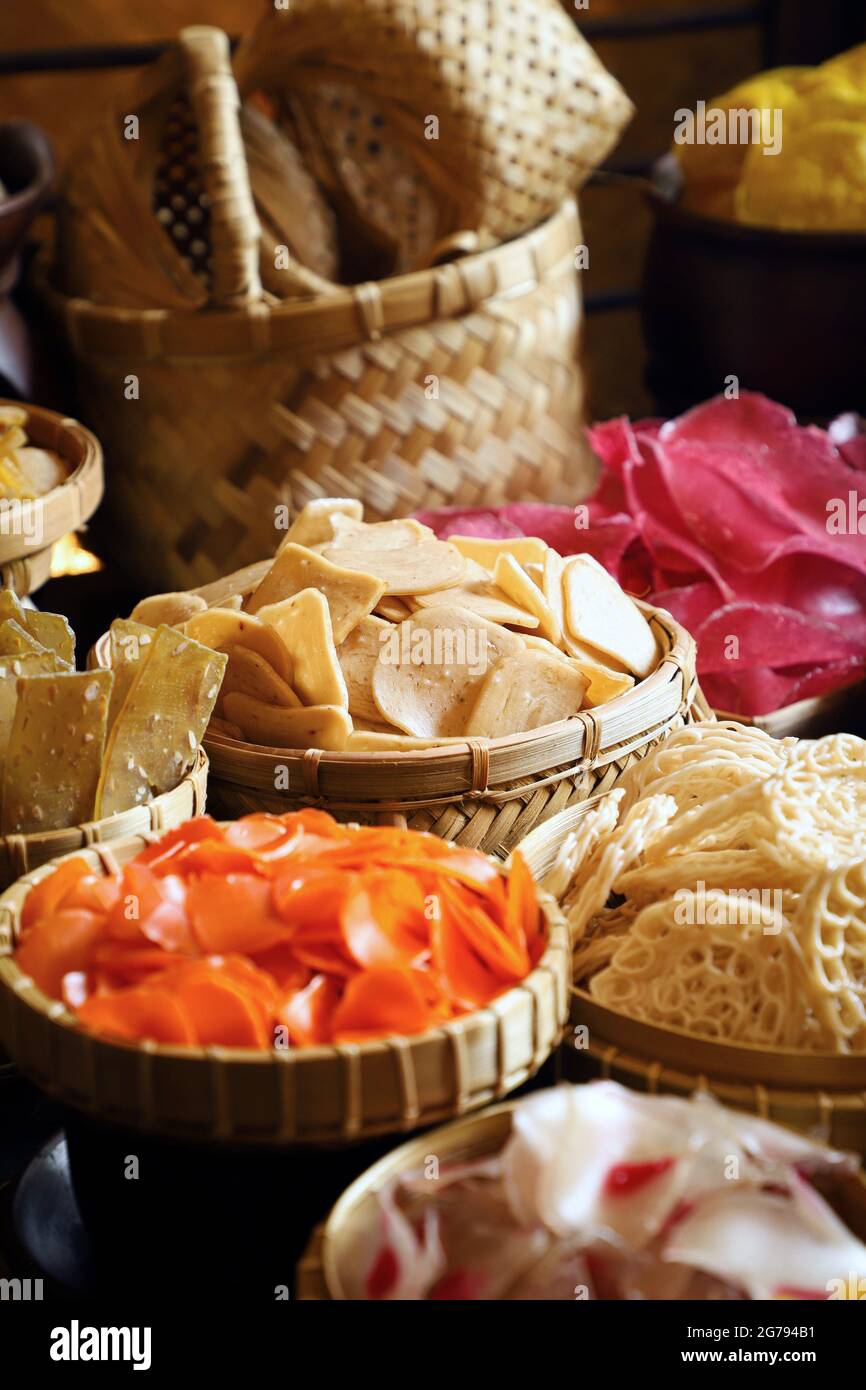Kerupuk Udang. Shrimp crackers sold in a market stall. Stock Photo