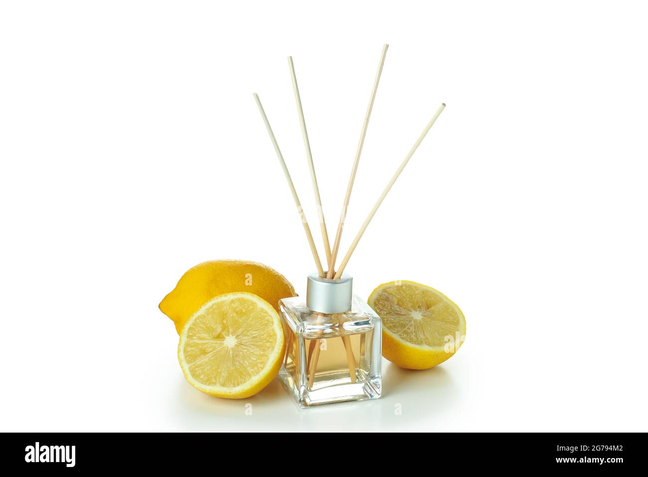 Diffuser bottle with sticks and lemons isolated on white background Stock Photo