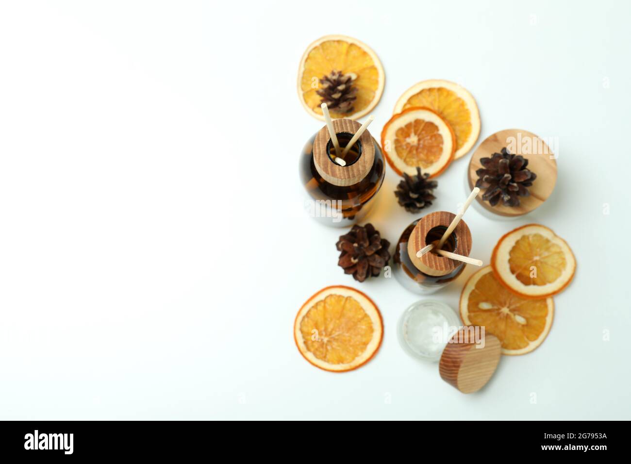 Diffusers, lemons and cones on white background Stock Photo