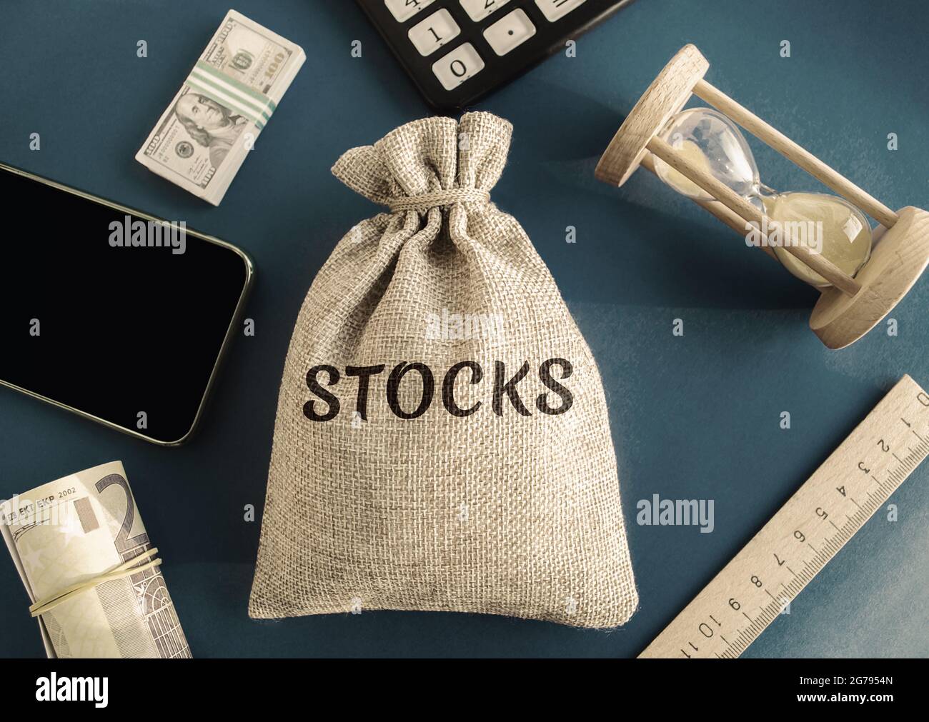 Money bag with the word Stocks. Trading on the stock exchange. Investment portfolio. Capital gains. Common and preferred stocks. Market trading and pr Stock Photo