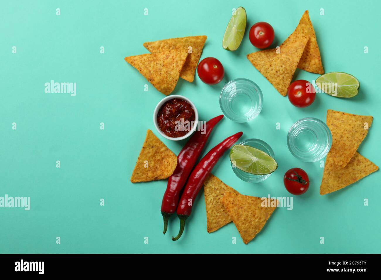Party concept with tequila, guacamole and chips Stock Photo Alamy