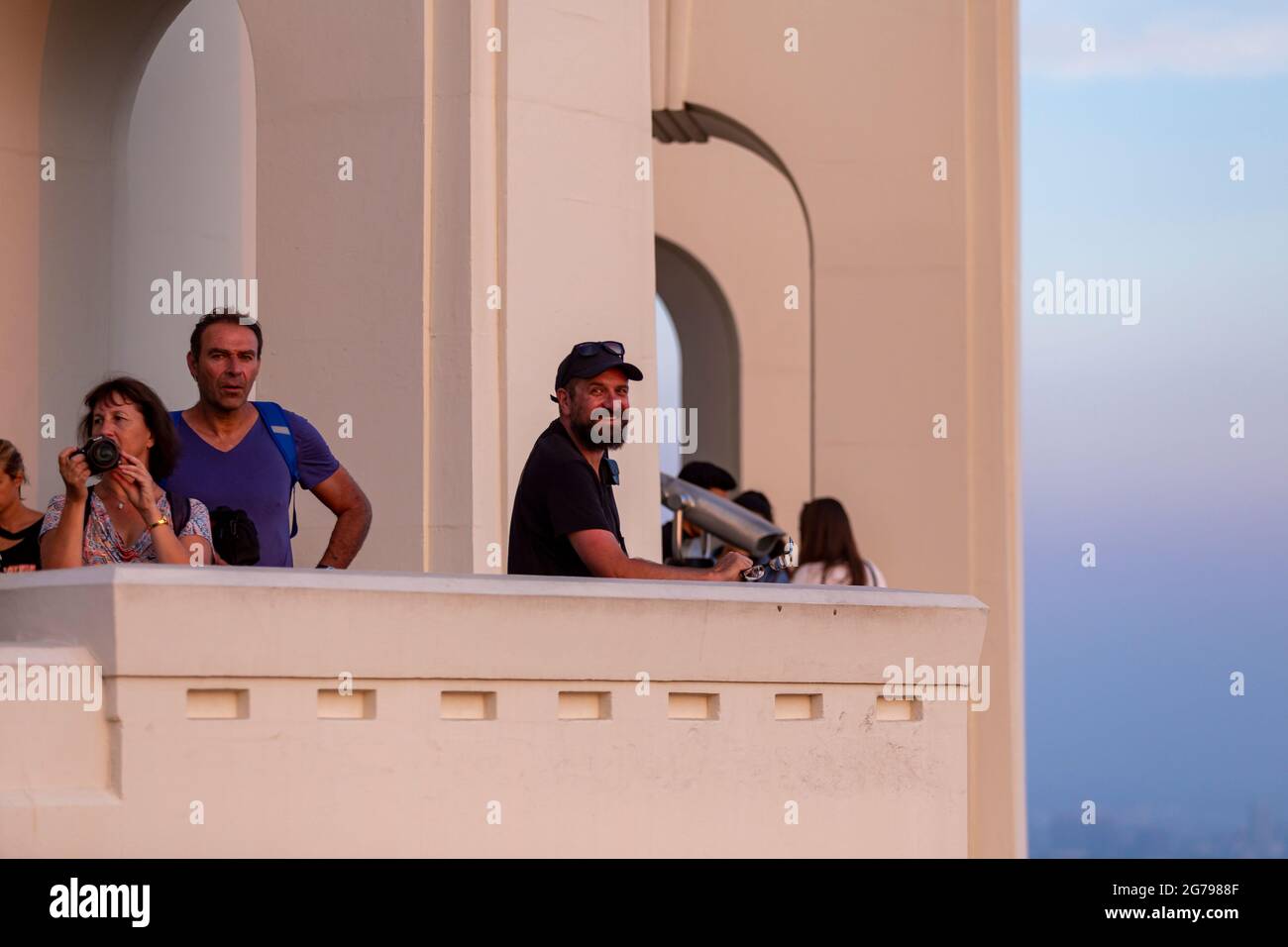 A caucasian Man, 45-50, at the balcony of the Griffith-Museum in Los Angeles, California, USA Stock Photo