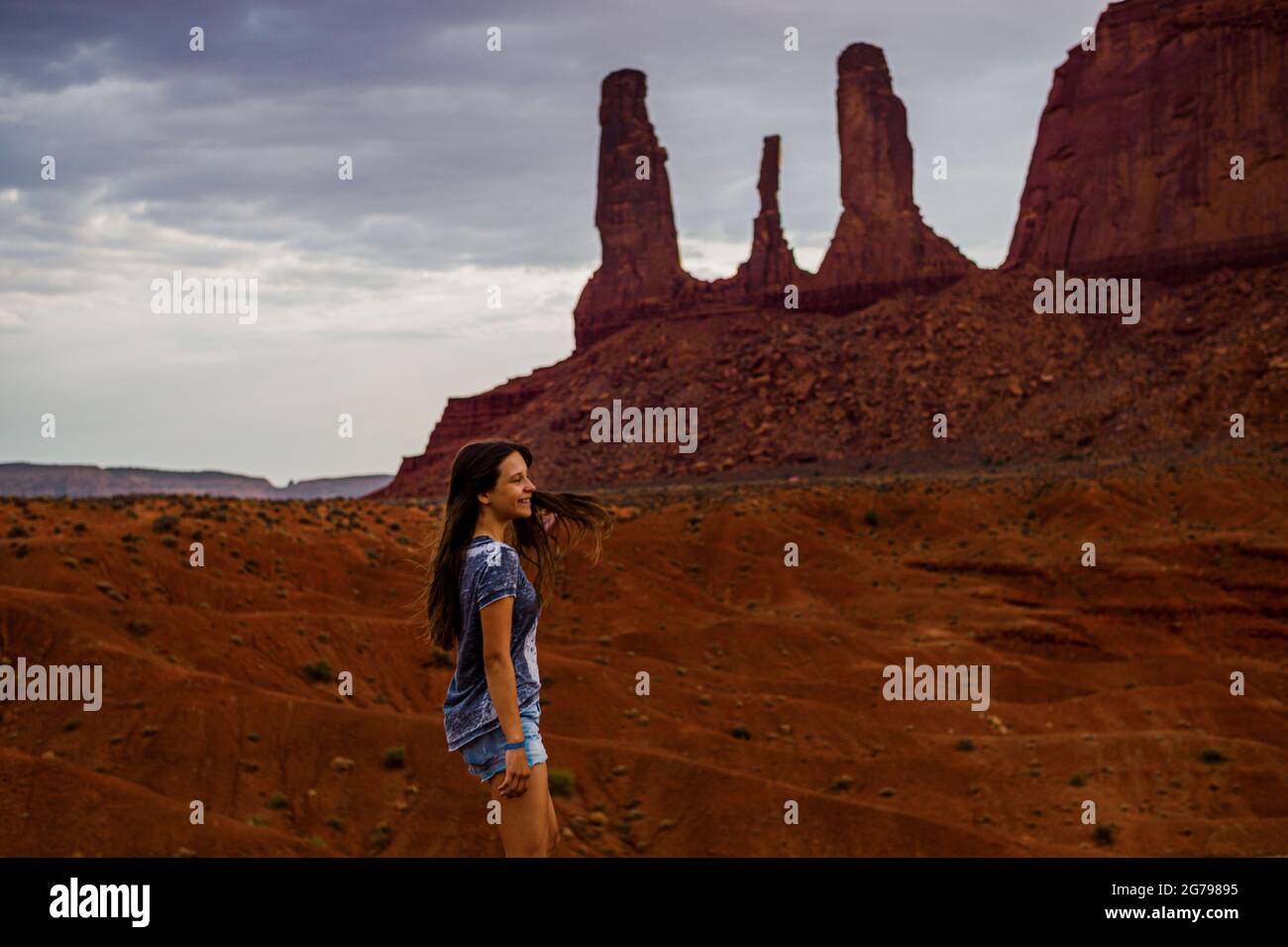 A caucasian girl, 15-20 years, in Monument Valley, Utah, USA Stock Photo