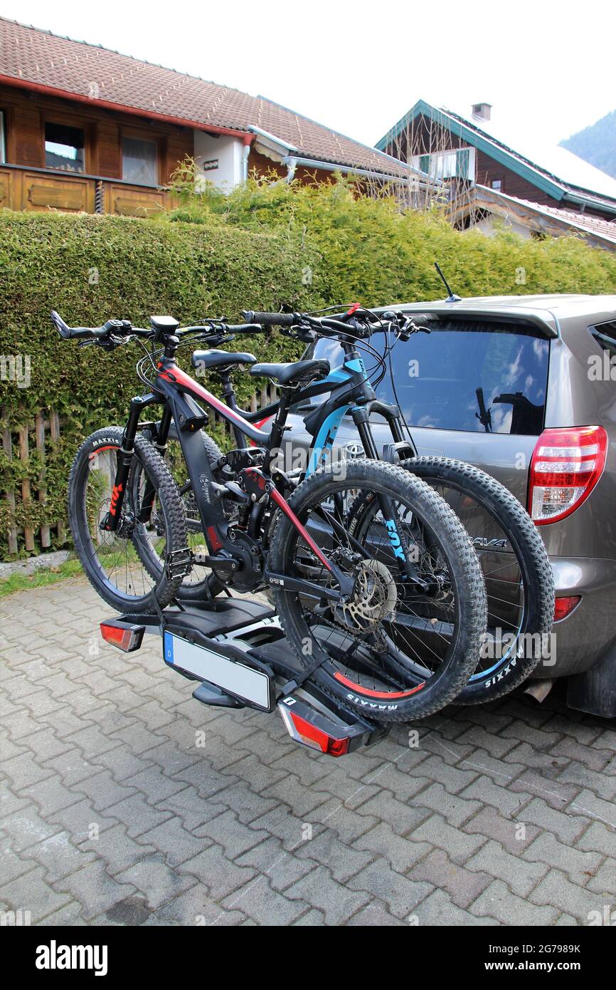 Car with bike rack, e-bike, e-bikes, Germany, Bavaria, Upper Bavaria, bicycle excursion Stock Photo