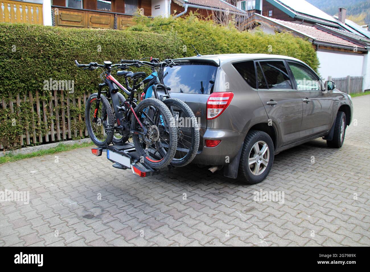 Car with bike rack, e-bike, e-bikes, Germany, Bavaria, Upper Bavaria, bicycle excursion Stock Photo