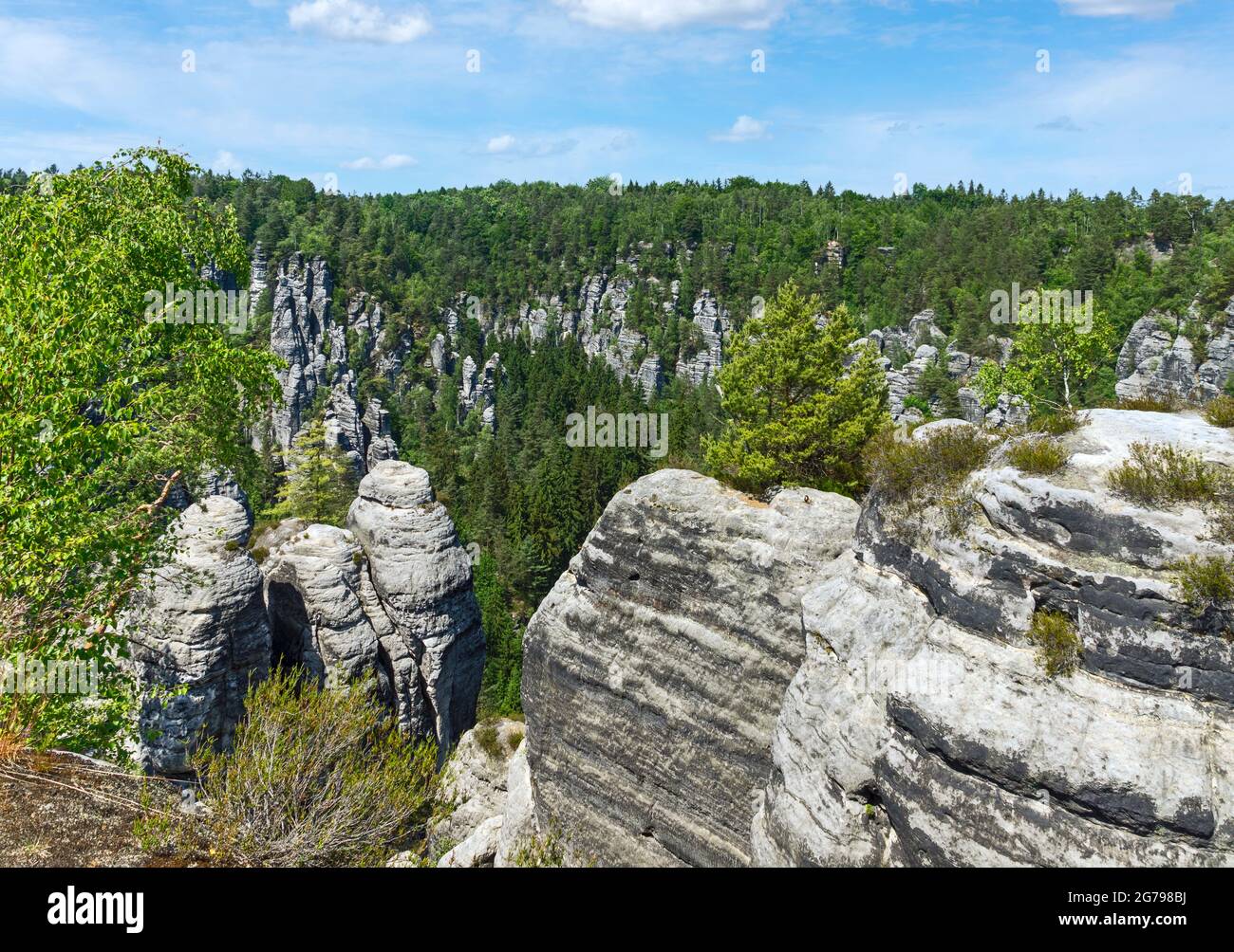 The Bastei is a rock formation with a viewing platform in Saxon Switzerland on the right bank of the Elbe in the area of the municipality of Lohmen. It is one of the most popular tourist attractions in Saxon Switzerland. Stock Photo