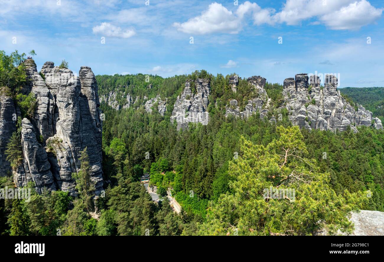 The Bastei is a rock formation with a viewing platform in Saxon Switzerland on the right bank of the Elbe in the area of the municipality of Lohmen. It is one of the most popular tourist attractions in Saxon Switzerland. Down in the Wehlgrund the Rathen rock stage Stock Photo