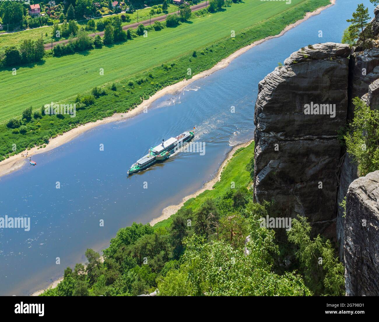 The Bastei is a rock formation with a viewing platform in Saxon Switzerland on the right bank of the Elbe in the area of the municipality of Lohmen. It is one of the most popular tourist attractions in Saxon Switzerland. View from the bastion Stock Photo