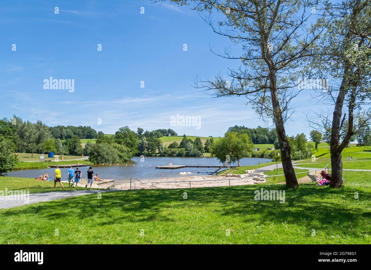 Germany, Baden-Wuerttemberg, Welzheim-Aichstrut, Aichstrut flood retention basin, Aichstruter reservoir, bathing area with sunbathing area. Excursion destination, local recreation area in the Welzheimer Forest in the Swabian-Franconian Forest Nature Park. Stock Photo