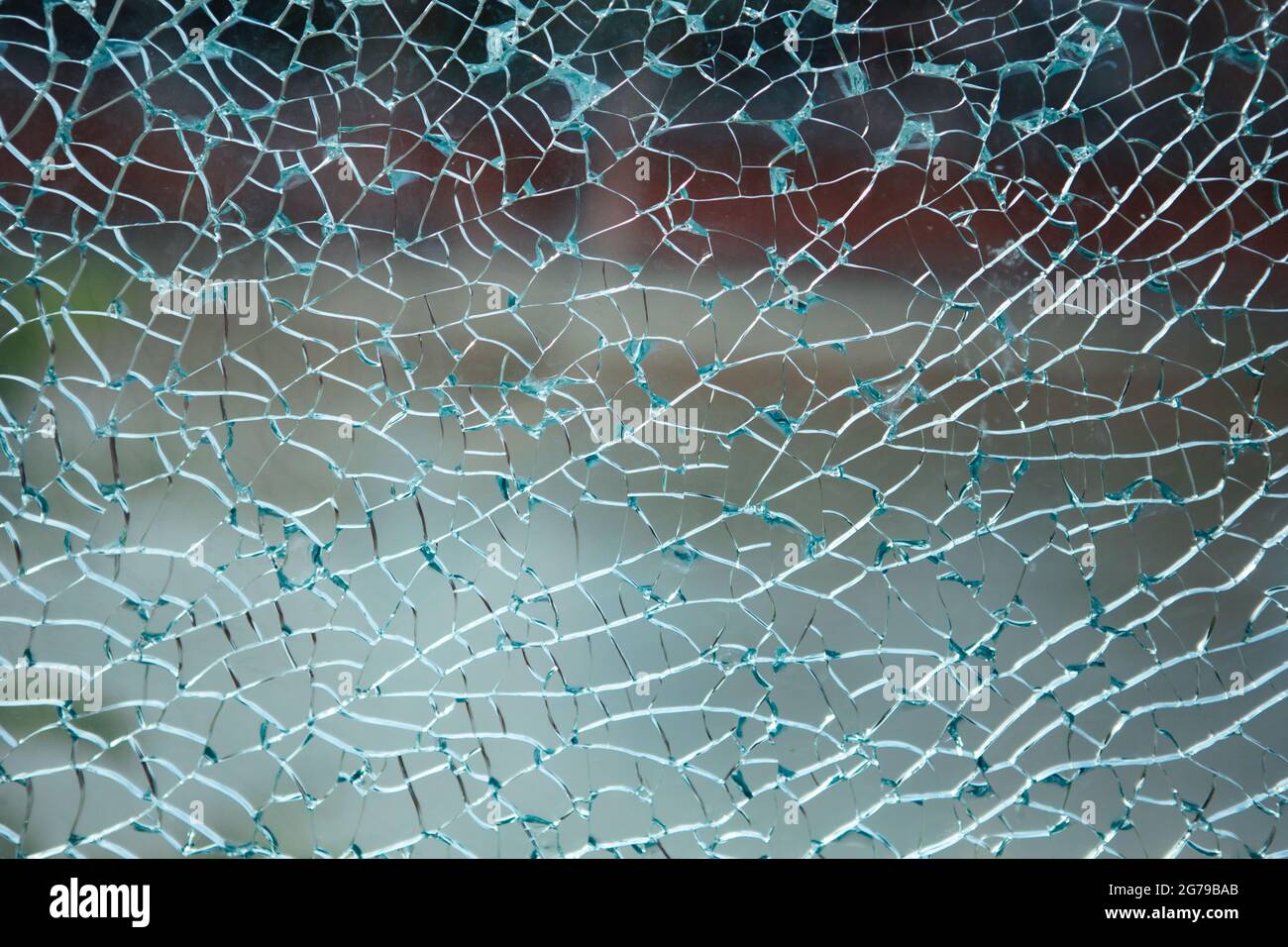 Shattered cracked glass background. Breaking the glass ceiling Stock