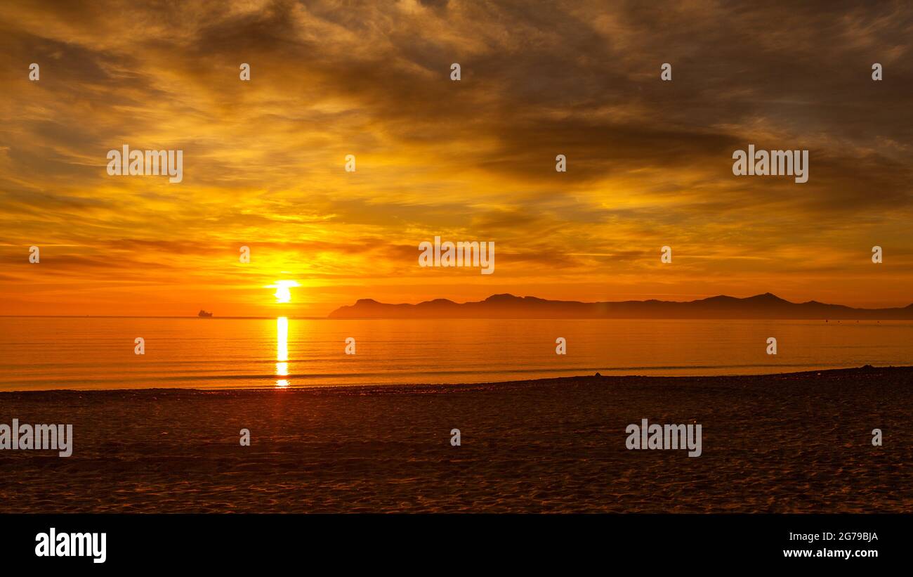 dramatic sunrise on Playa de Muro Stock Photo