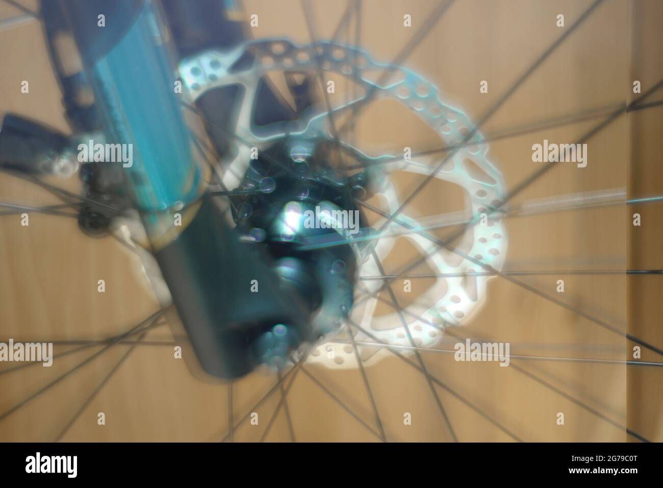 Wheel hub of an electric bike | Bicycle fork. Emotional motifs with blurring, background / graphics / composing / real photography without blurring filters Stock Photo