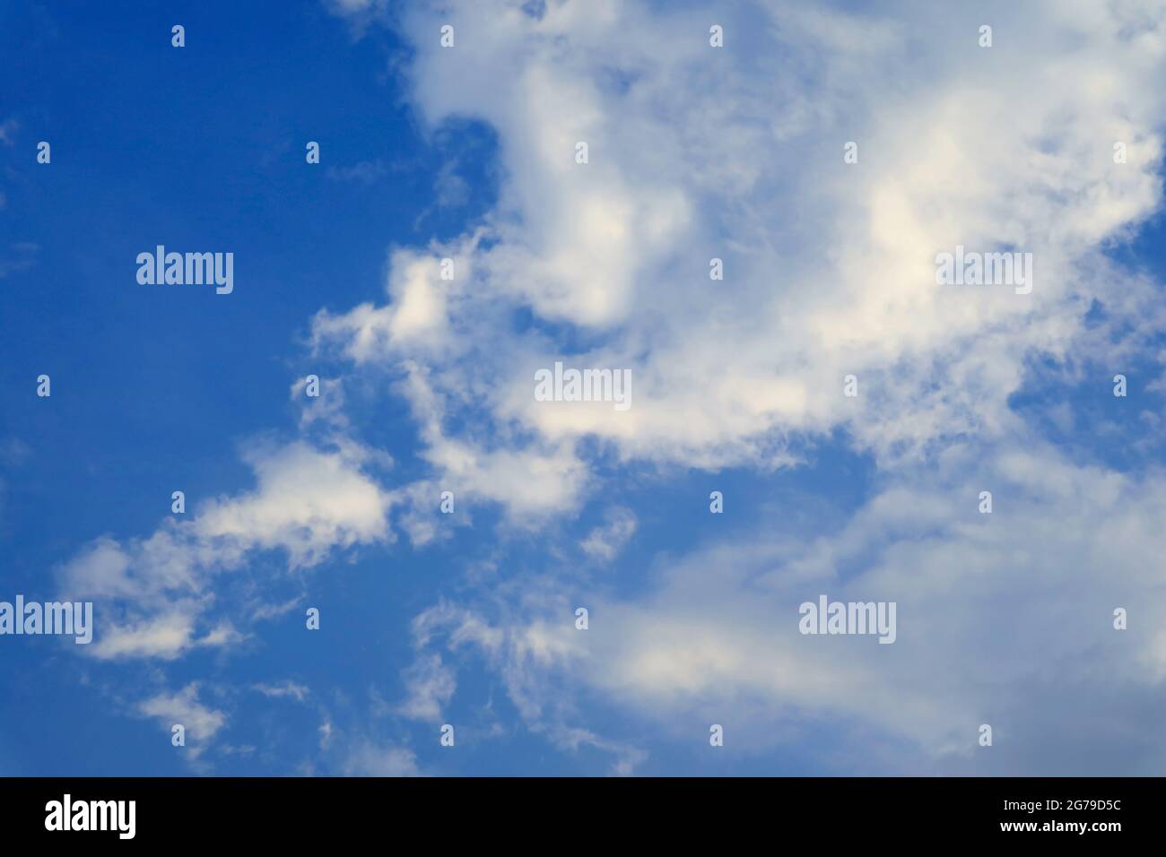 White Clouds Floating on Blue Sky Stock Photo