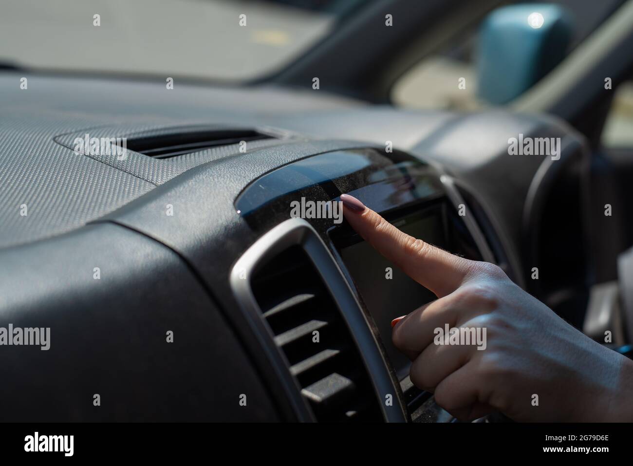 Wipe dust off car dashboard with finger Stock Photo Alamy