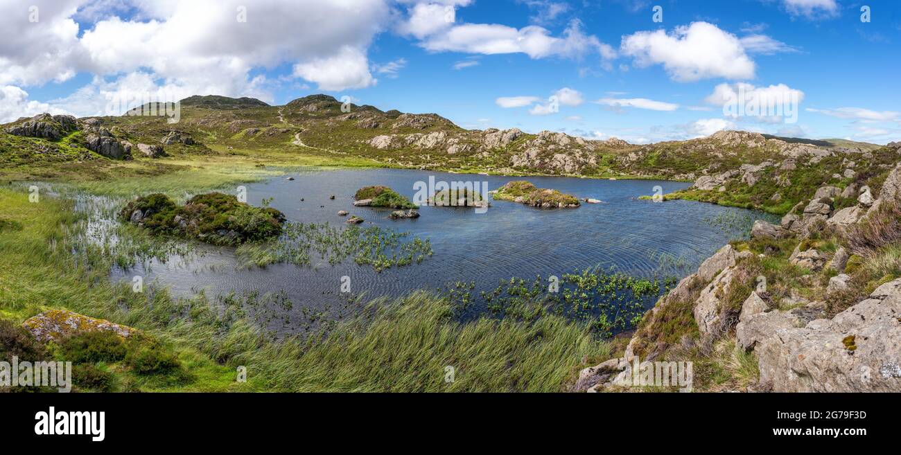 Inomminate Tarn on Haystacks Fell above Buttermere in the Lake District UK beloved of Alfred Wainwright and the location his ashes were scattered Stock Photo