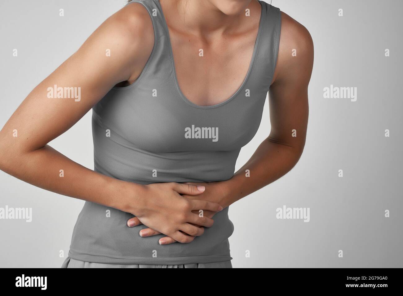 woman holding her stomach diarrhea abdominal pain Stock Photo Alamy