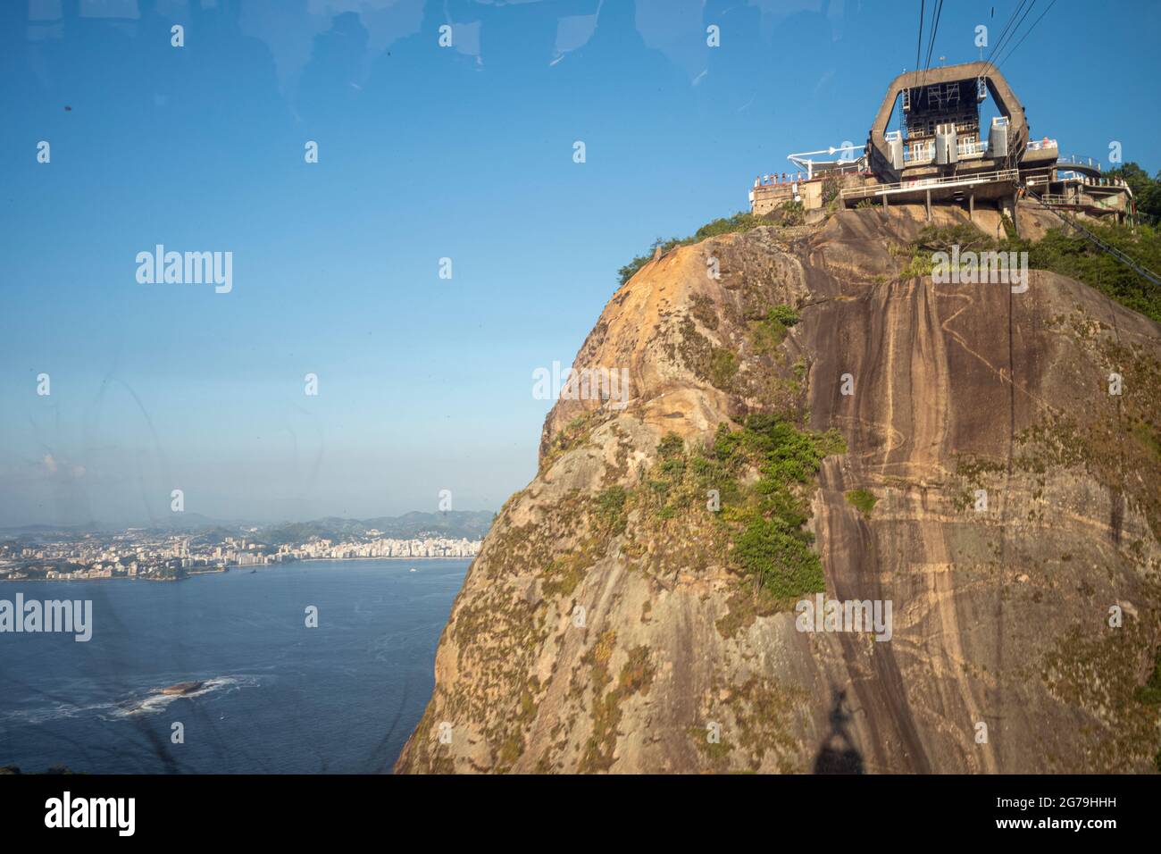 View of the Sugar loaf Mountain from inside the cable car that accesses the upper part of the hill. Stock Photo