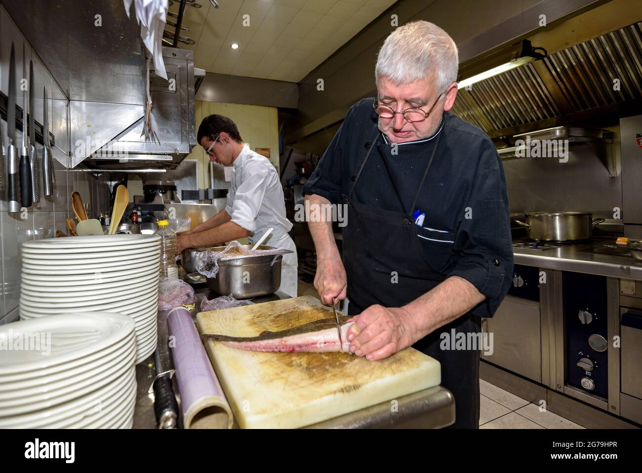 Chef Toni Sala and his team in the kitchen of the Fonda Sala. This restaurant was awarded with a Michelin star (Osona, Barcelona, Catalonia, Spain) Stock Photo