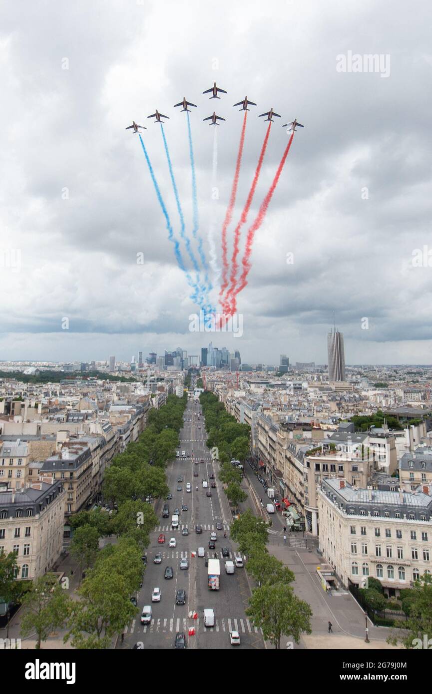 Alphajet airplanes of the French elite acrobatic flying team Patrouille de France (PAF) fly over Paris, during a practice session prior to July 14s Bastille Day Parade, on July 12, 2021. Photo by Raphael Lafargue/ABACAPRESS.COM Stock Photo