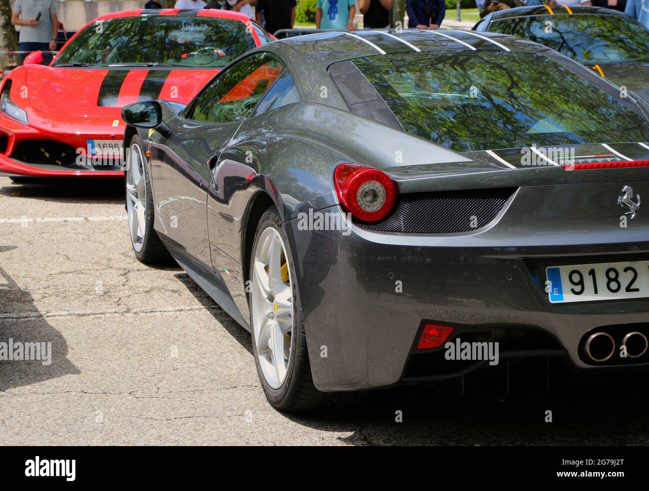 Close up of the rear of a grey Ferrari 458 Italia car parked at a Super ...