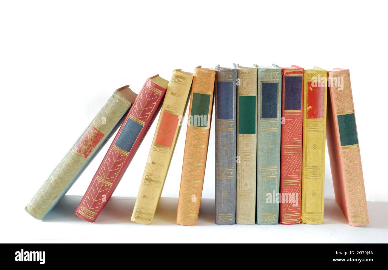 row of books on white background. Reading,literature,education,library,home office, back to school concept,panoramic, large free copy space Stock Photo