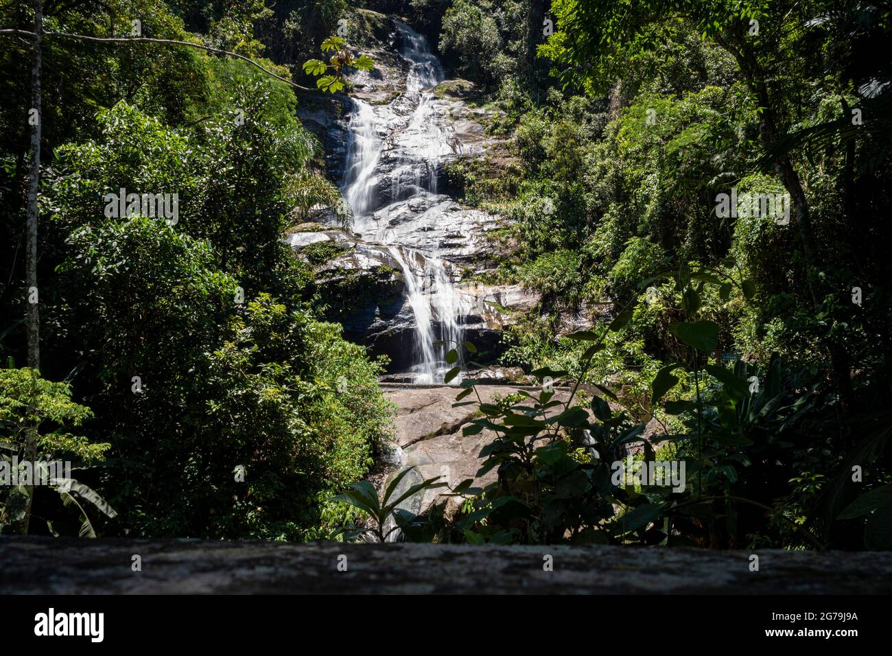 Beautiful waterfall called 'Cascatinha Taunay' on green nature in the Atlantic Rainforest, Tijuca Forest National Park in Alto da Boa Vista, Rio de Janeiro, Brazil Stock Photo