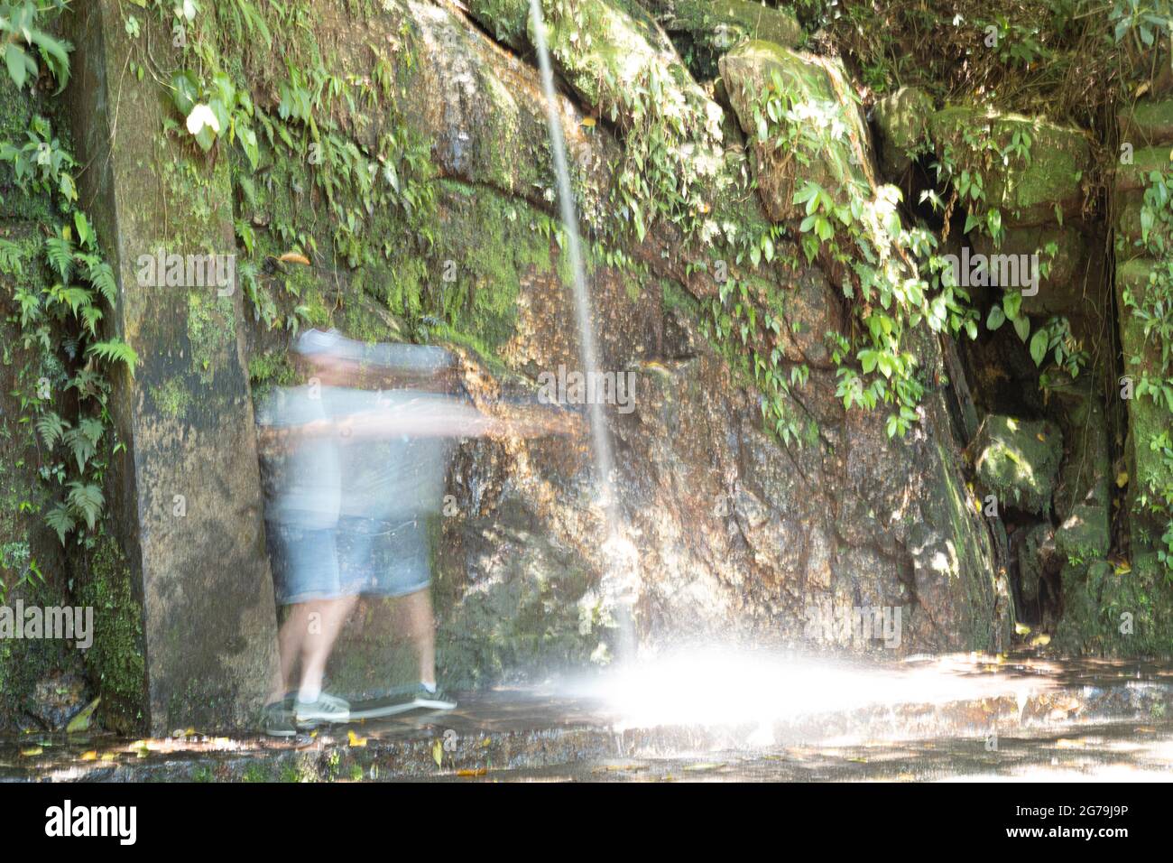 Beautiful waterfall called 'Cascatinha Taunay' on green nature in the Atlantic Rainforest, Tijuca Forest National Park in Alto da Boa Vista, Rio de Janeiro, Brazil Stock Photo