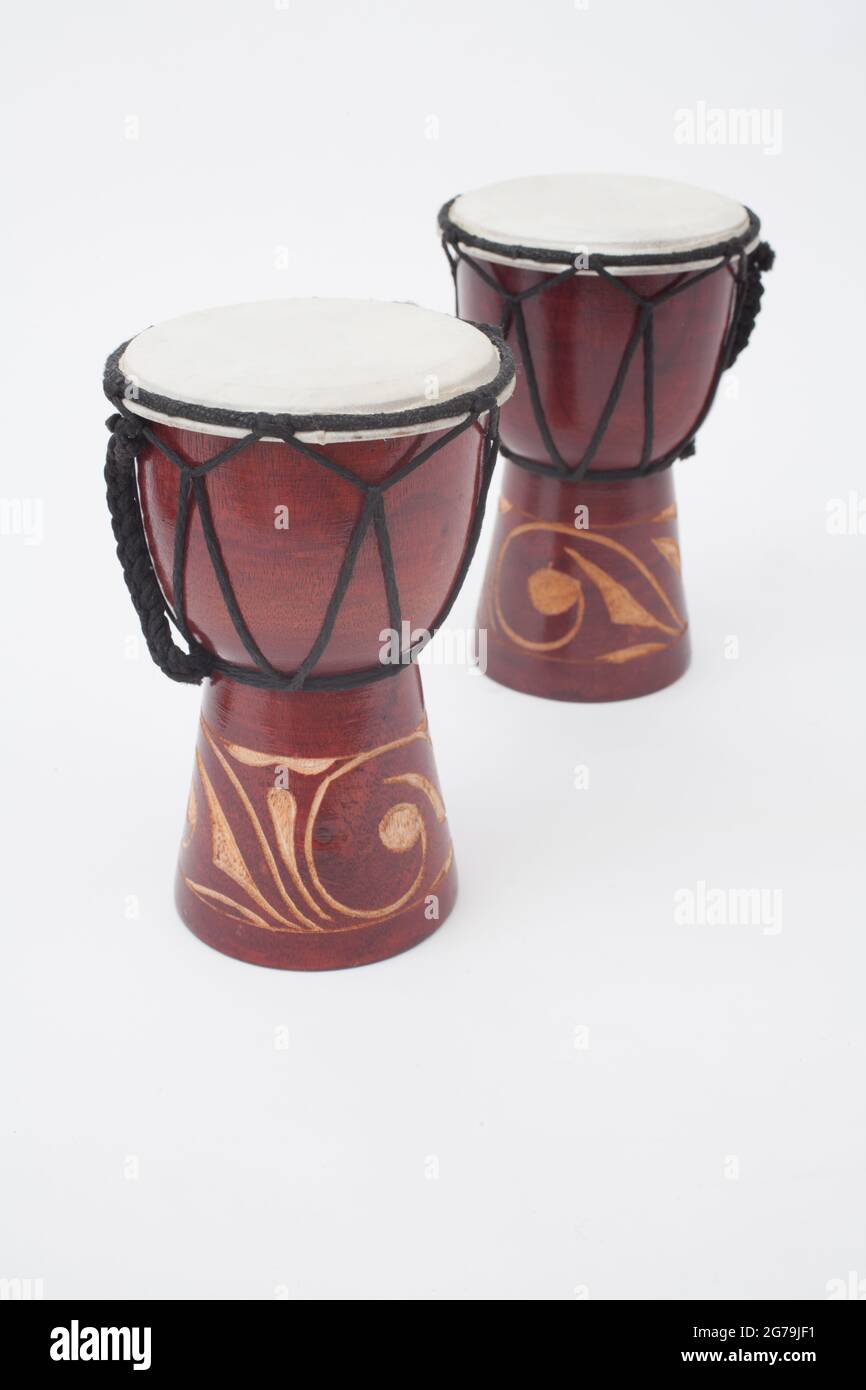 A pair of handmade wooden African hand drums Stock Photo Alamy