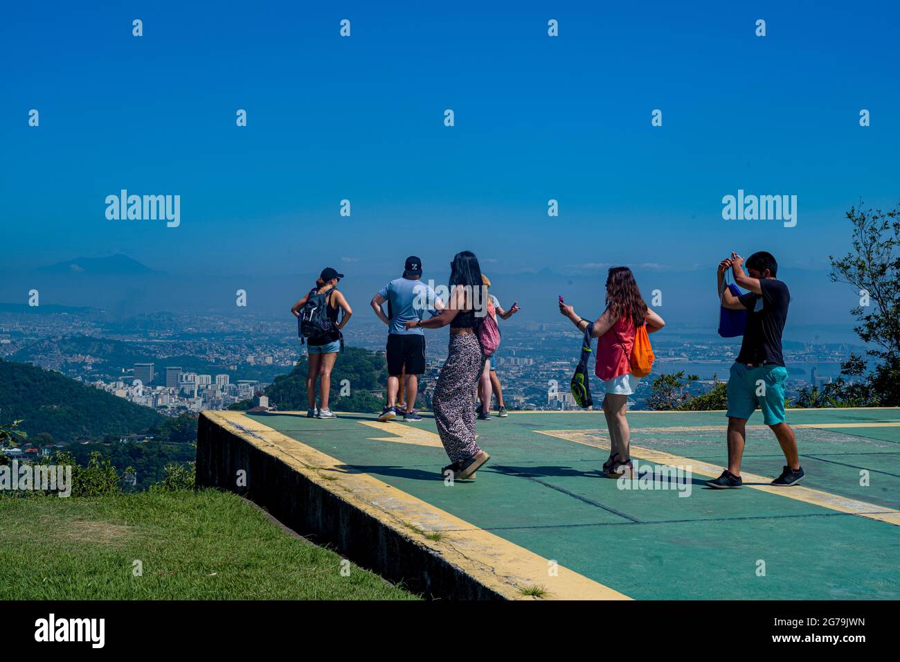 Enjoying the spectacular View from Mirante Dona Marta on Guanabara Bay on a clear day with blue sky and mountains in the background and Atlantic Ocean in Rio de Janeiro, Brazil, South America Stock Photo