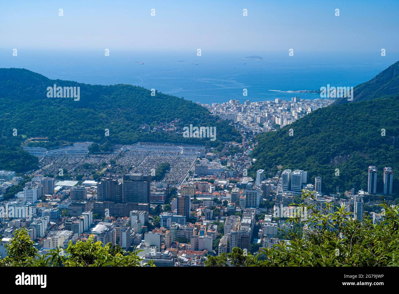 Enjoying the spectacular View from Mirante Dona Marta on Guanabara Bay on a clear day with blue sky and mountains in the background and Atlantic Ocean in Rio de Janeiro, Brazil, South America Stock Photo