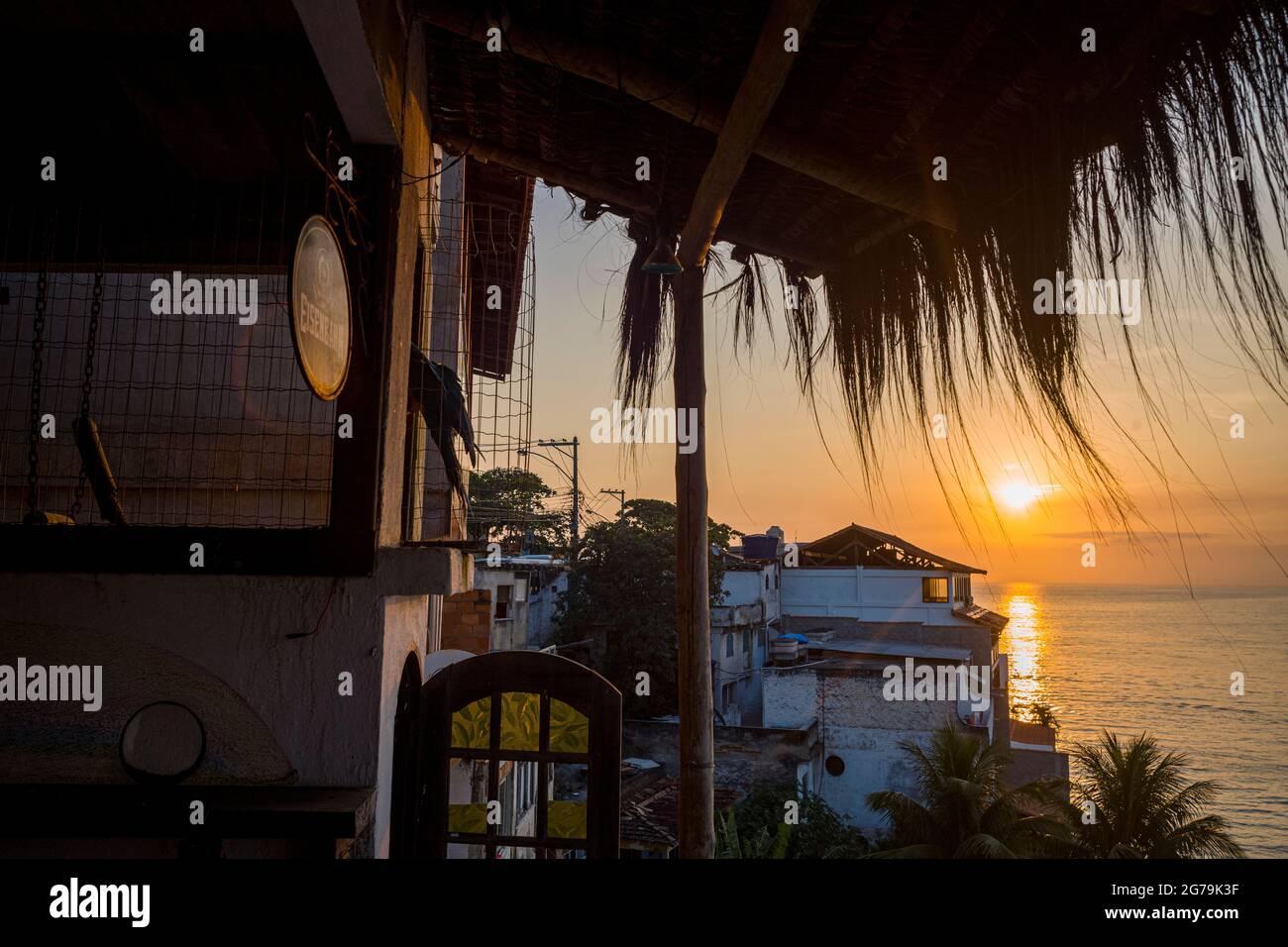 Enjoying the wonderful sunset at Prainha da Barra de Guaratiba from the Marambaia Roof Top Cafe rio Stock Photo