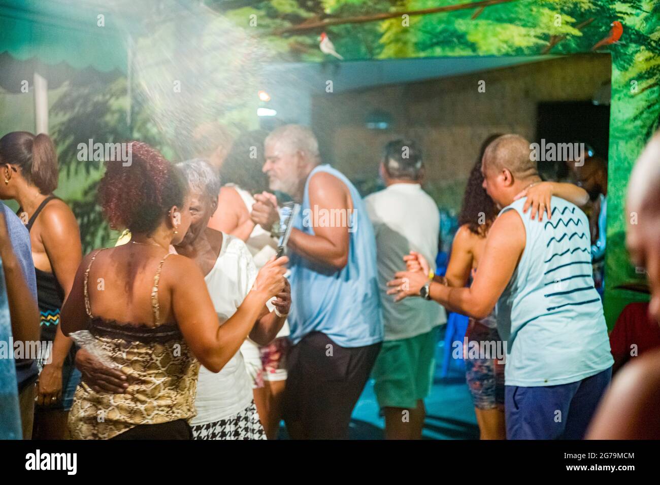 Party hard through the night with the locals - the Cariocas - in the favela 'Pereira da Silva' in Santa Teresa, Rio de Janeiro. Shot with Leica M10 Stock Photo