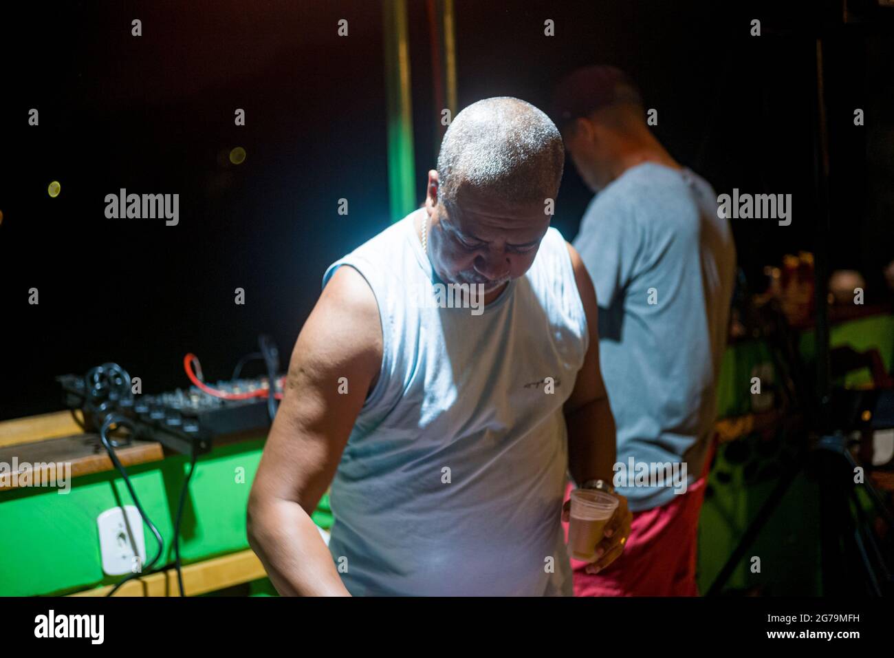 Party hard through the night with the locals - the Cariocas - in the favela 'Pereira da Silva' in Santa Teresa, Rio de Janeiro. Shot with Leica M10 Stock Photo