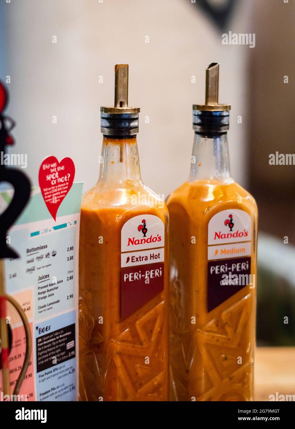 Bournemouth, UK. Nov. 6th, 2019. Peri Peri Extra Hot Sauce from a Nandos' Restaurant. Stock Photo