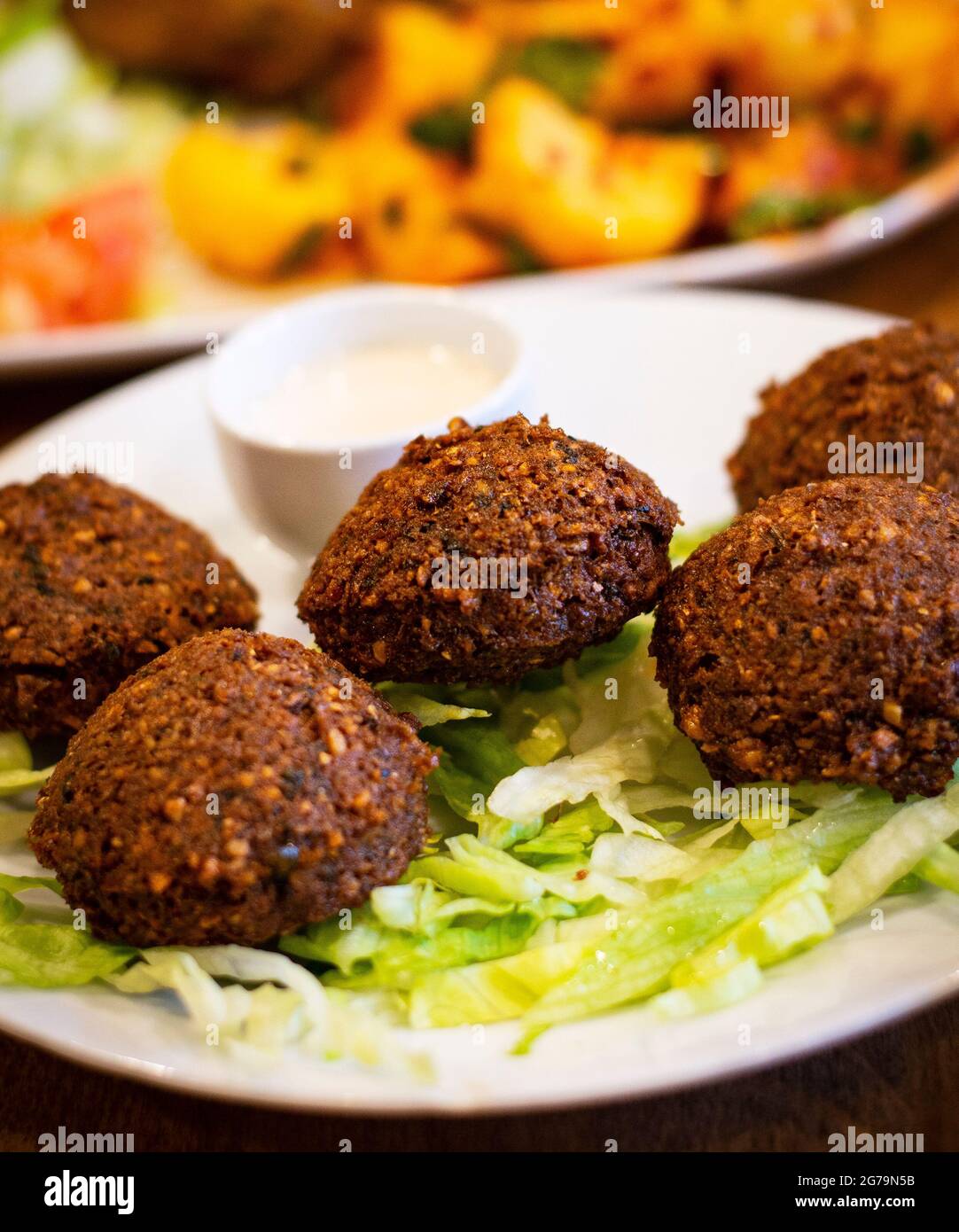 Deep Fried Falafel (Chickpea Balls) with Tahini Sauce. Authentic Middle  Eastern Dish Stock Photo - Alamy